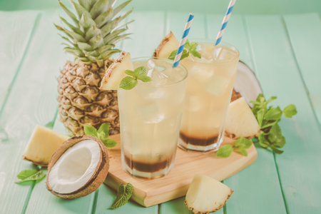 Summer coffee cocktail with coconut and pineappleの写真素材