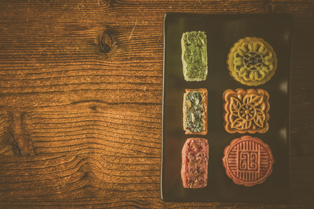 Mid Autumn Festival concept - yuebing monncakes on rustic backgroundの写真素材