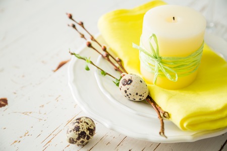 Spring easter table setting with silverware and napkins, copy space