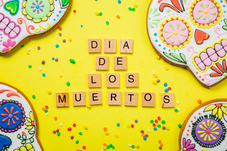 Dia de los muertos concept - skull shaped cookies with colorful decorations