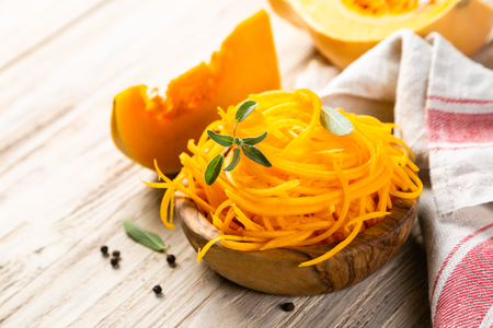 Butternut squash vegetarian noodles on rustic backgroundの写真素材