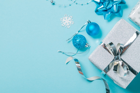 Christmas background - presents and decorations in silver and blue, top viewの写真素材