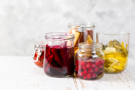 Preparing drinking vinegar infusions in glass jars