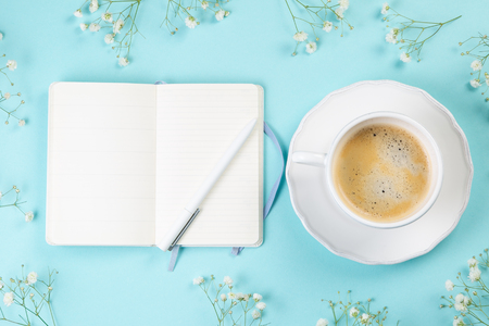 Good morning concept - coffee, flowers, notebookの写真素材