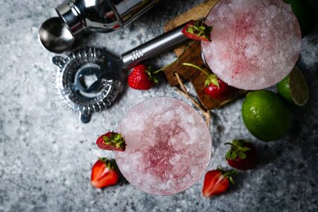 Strawberry margarita cocktail and ingredients, copy spaceの写真素材