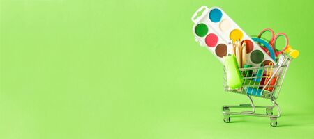 BAck to school concept - supplies on green backgroundの写真素材