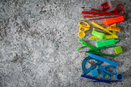 Selection of colorful stationery on rustic backgroundの写真素材