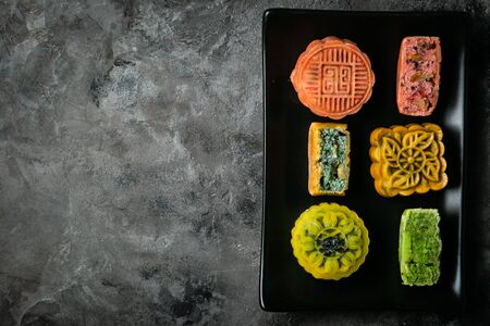 Mid Autumn Festival concept - yuebing monncakes on rustic backgroundの写真素材