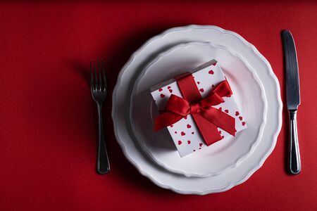 Valentines day present on red