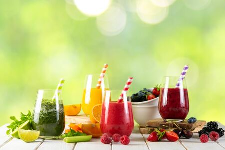 Selection of colorful smoothies in glassesの写真素材