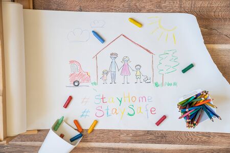 Drawing of family wearing face masks - covid concept, stay home and stay safeの写真素材