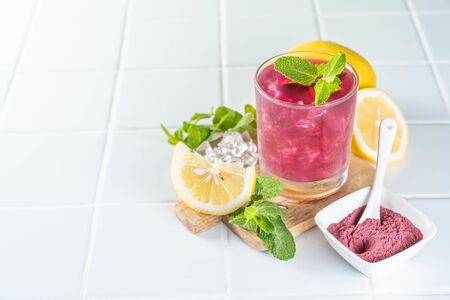Red matcha lemonade, white backgroundの写真素材