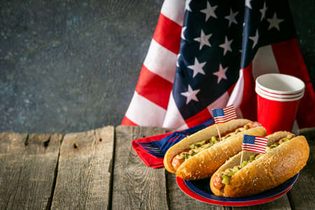 USA national holiday Labor Day, Memorial Day, Flag Day, 4th of July - hot dogs with ketchup and mustard on wood backgroundの写真素材