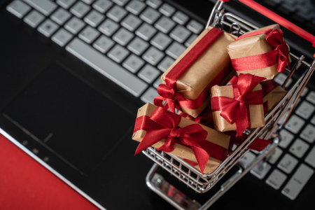 Online shopping for Valentines day concept - presents in shopping cartの写真素材