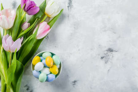 Easter concept - cookies with flowers on marble background
