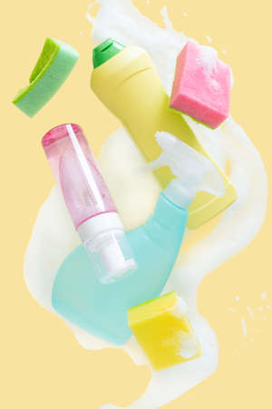 Cleaning concept - velitation of cleaning supplies on pastel backgroundの写真素材