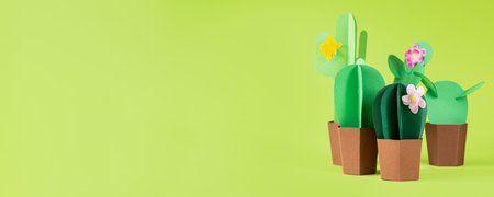 Cinco de Mayo concept - paper craft cactus on solid color background, bannerの写真素材
