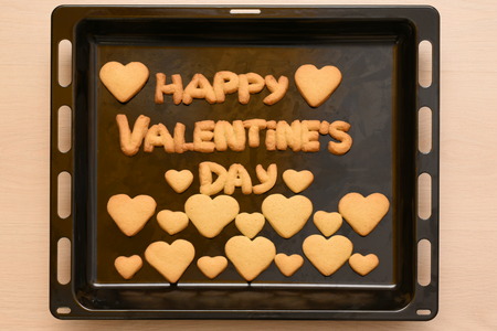 Cookies in the shape of heart and letters on Valentines Dayの写真素材