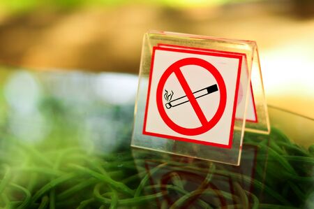 No smoking sign on a table by the public の写真素材