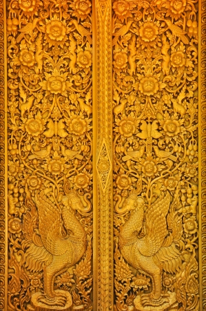 Golden sculpture  The temple doors in Thailand のeditorial素材