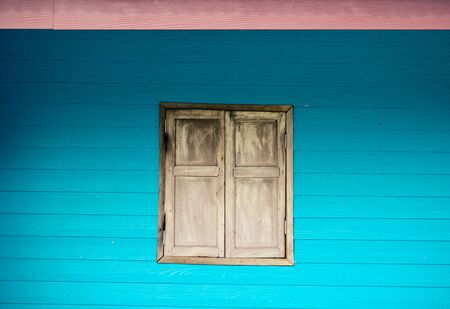 window  and blue wall vintage styleの写真素材
