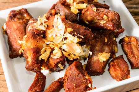 Garlic Pork on wood backgroundの写真素材