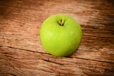 fresh green apples  on a table.の写真素材