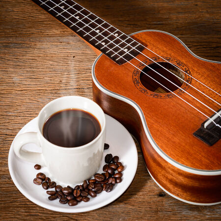 coffee cup and coffee beans and Ukuleleの写真素材
