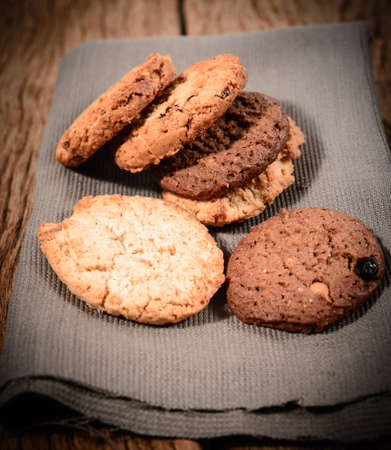 Stacked cookies on brown napkin