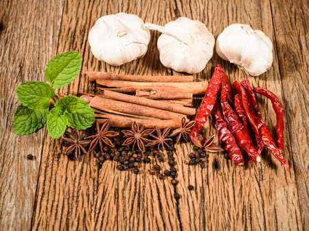 Herbs and Spices on wooden backgroundの写真素材