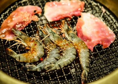 prawns and pork grilled on the grill