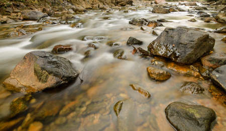River in mountain to autumnの写真素材