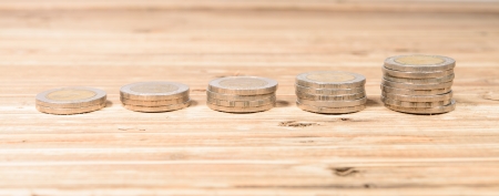 Coins Steps Thai Baht on wood backgroundの写真素材