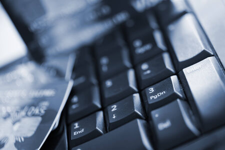 Close up shot of credit card and computer keyboardの写真素材