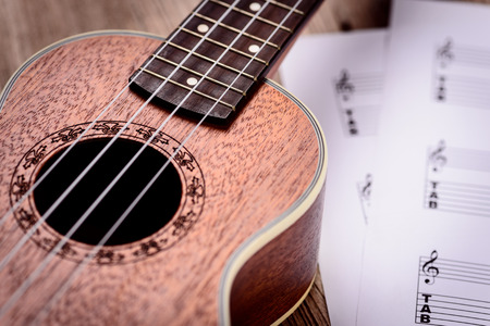 Ukulele and musical paper notesの写真素材
