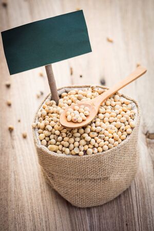 closeup of soybeans in sack with labelの写真素材