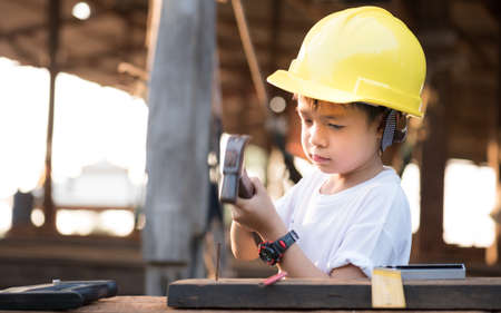 Little "engineer" ; , concept carpenterの写真素材