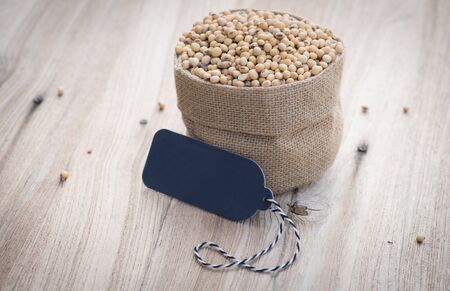 Soybeans in sack with labelの写真素材