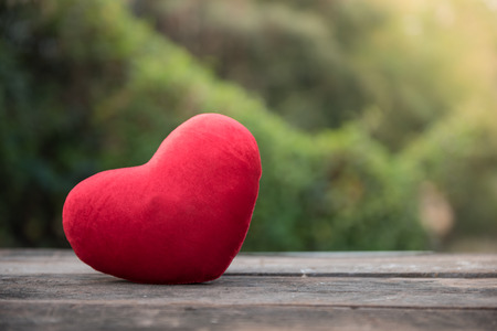 Valentines Day background with heart on old woodの写真素材