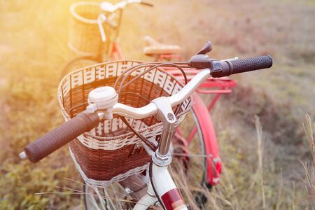 beautiful landscape image with Bicycle at sunset ; vintage filter styleの写真素材