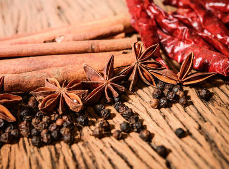 Herbs and Spices over wooden backgroundの写真素材
