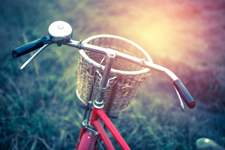 Vintage Bicycle with Summer grassfield ; vintage filtered tone styleの写真素材