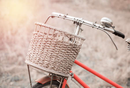Vintage Bicycle with Summer grassfield ; vintage filtered tone styleの写真素材
