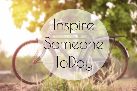 beautiful landscape image with Bicycle at sunset ; life quote. Inspirational quote. Motivational backgroundの写真素材