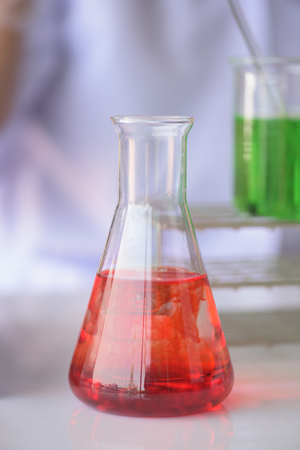 clinician holding tools during scientific experiment in laboratoryの写真素材