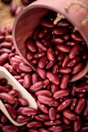 Red Kidney bean spilling out of a sackの写真素材