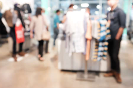 Abstract blurred people walking in shopping centerの写真素材