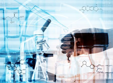 chemist dropping the clear reagent into test tube for reaction testing in chemical laboratory, with chemical equations and periodic table background.Double exposure styleの写真素材