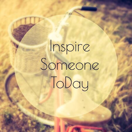 Vintage Bicycle with Summer grassfield  ; life quote. Inspirational quote. Motivational backgroundの写真素材