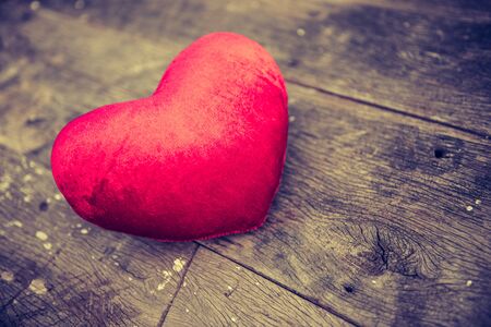 Valentines Day background with heart on old woodの写真素材